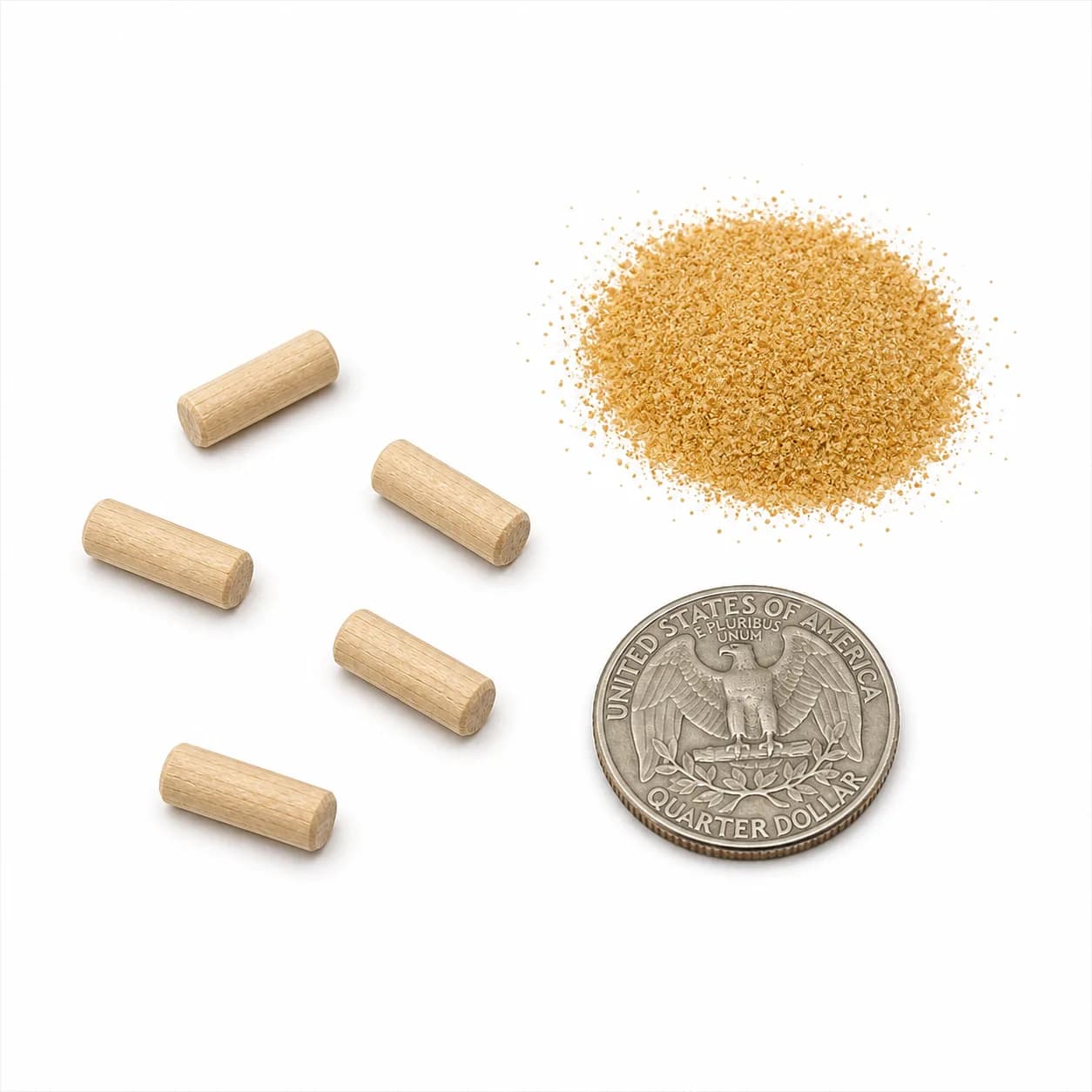 Five pale hardwood pegs beside a pile of golden corn cob granules and a US quarter